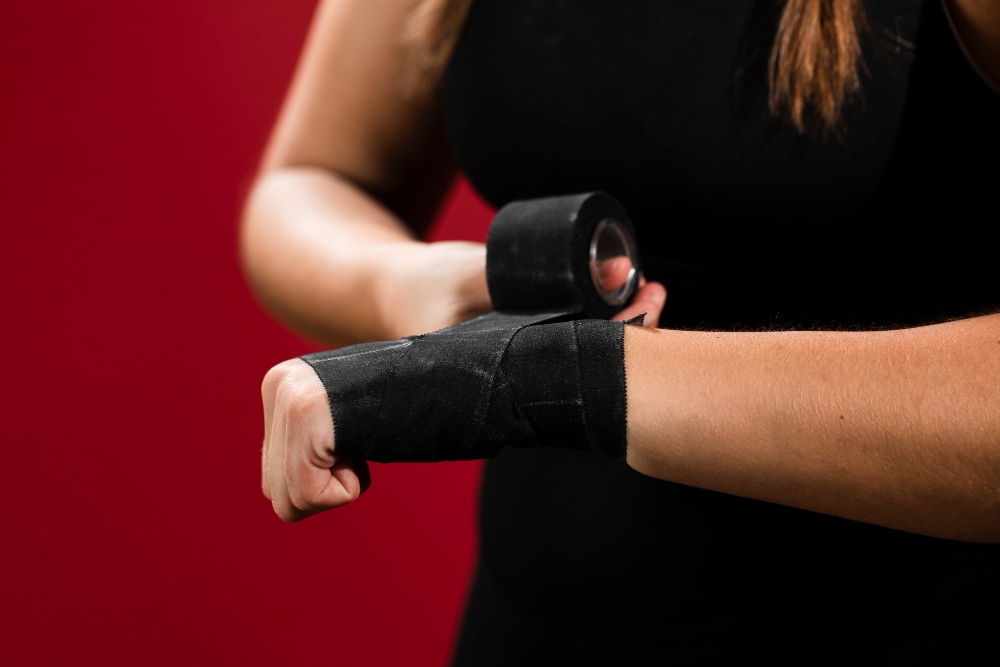 medium shot woman with bandaged hands