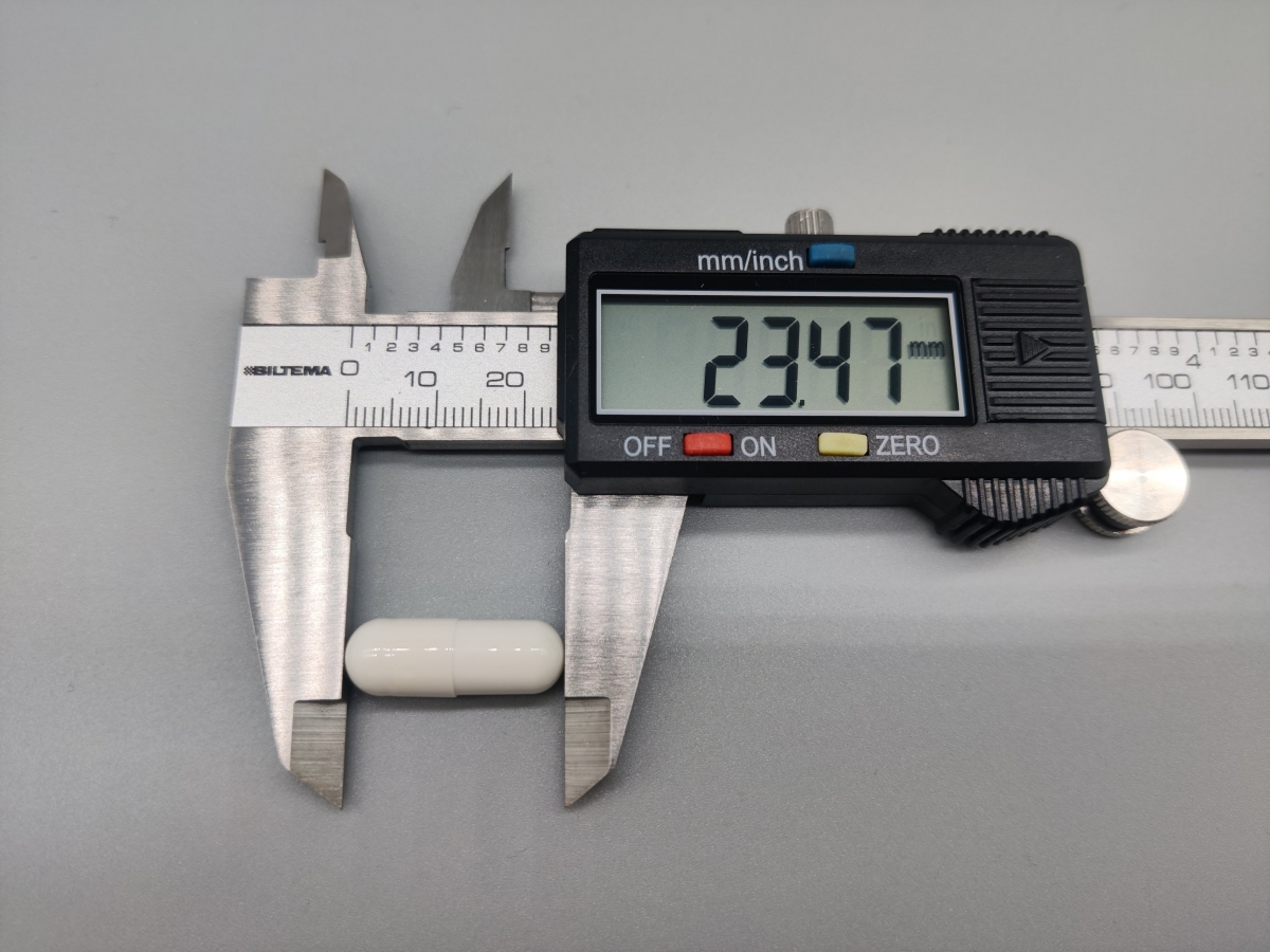 Mätning av Body Science D-vitamin kapsel med skjutmått 23,47 mm
