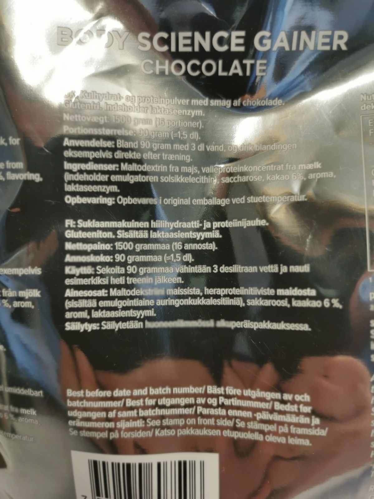 Detalj av flerspråkig panel med dosering 90 g vårt foto