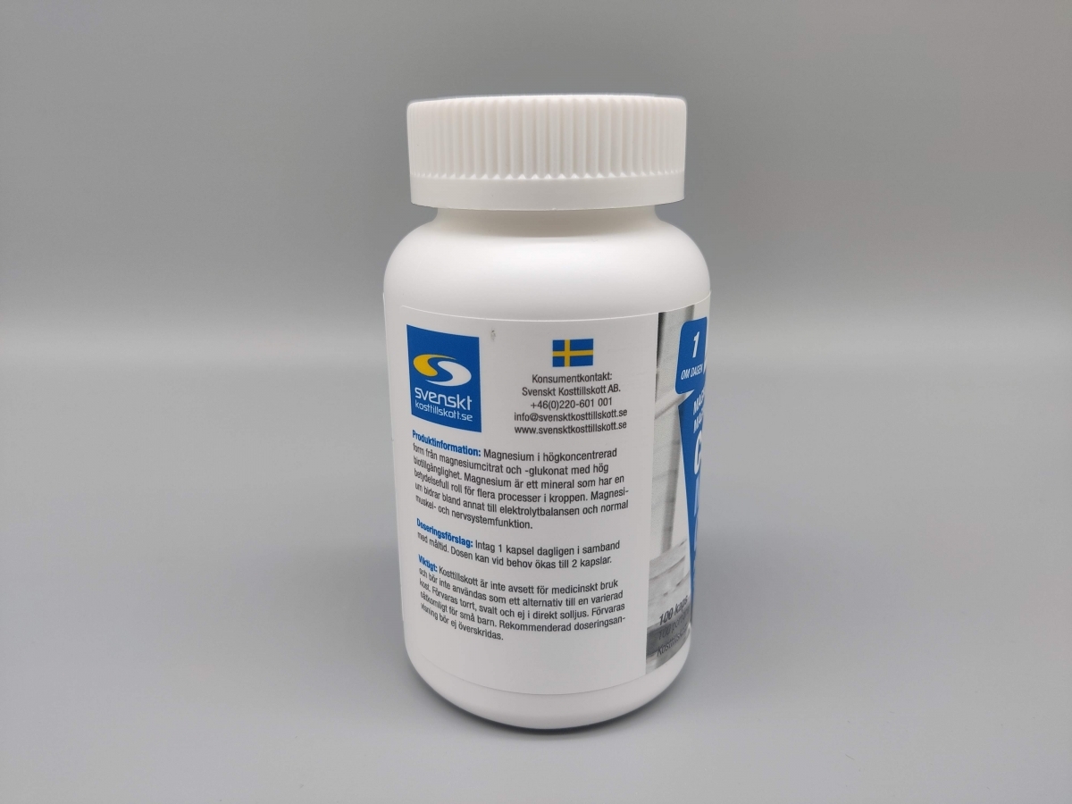 Baksida med produktinformation och konsumentkontakt på Core Magnesium Citrat