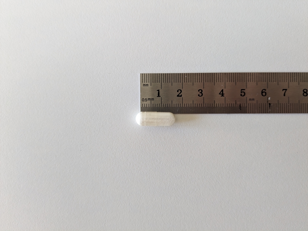 Kapsel från Core Selen 200 uppmätt mot linjal cirka 1,9 cm fotad i vårt test