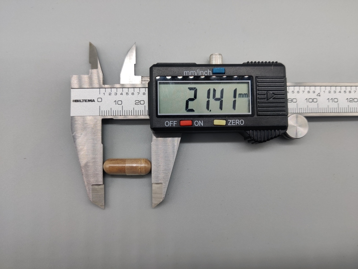Kapsel mätt med skjutmått cirka 21 mm, Healthwell Ashwagandha Premium