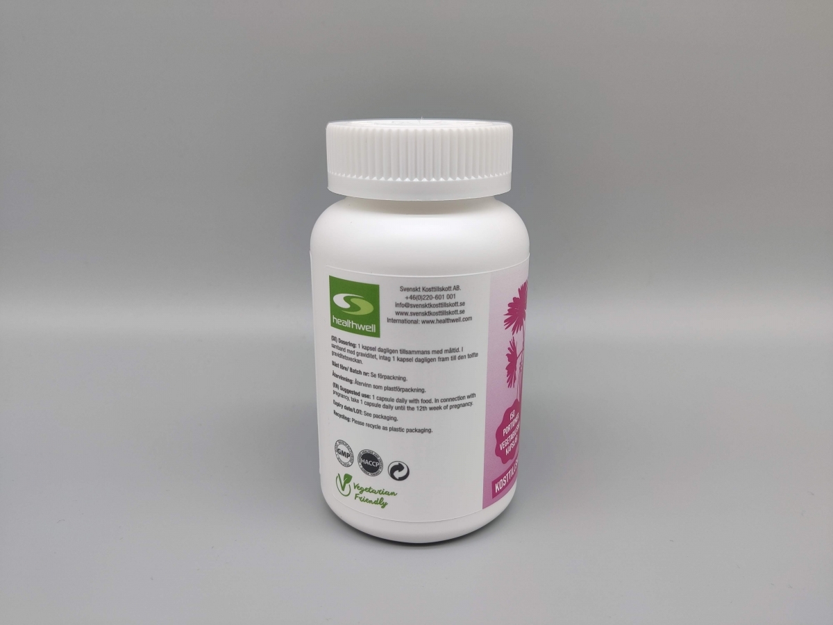 Sidan av Healthwell-burken med GMP och Vegetarian Friendly symboler, fotograferad av oss