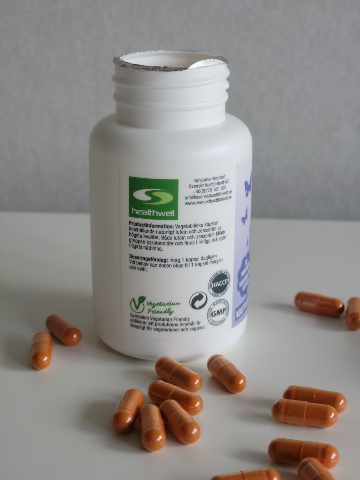 Healthwell Super Lutein baksida med dosering och veganmärkning