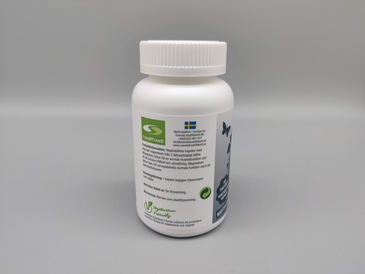 Healthwell Trippel Magnesium med svensk märkning och vegetarisk symbol, fotograferad av oss