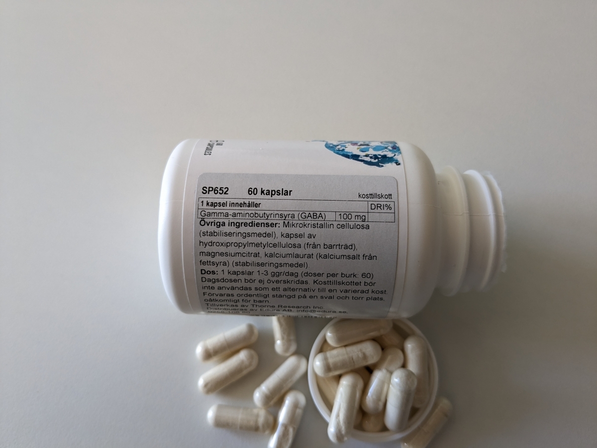 Innehållsetikett Thorne PharmaGABA-100 100 mg per kapsel, foto av oss