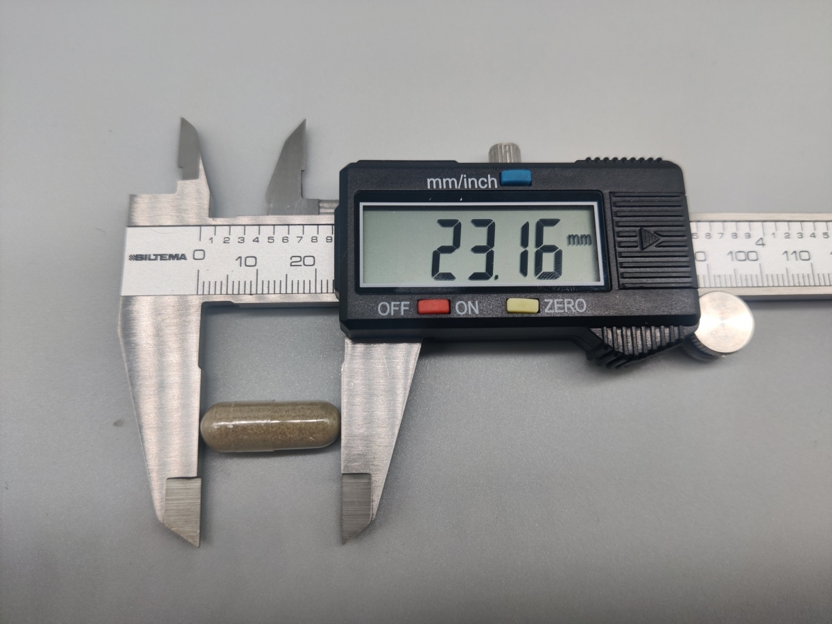 Kapsel mätt med skjutmått till cirka 23 mm, egen mätning under testet